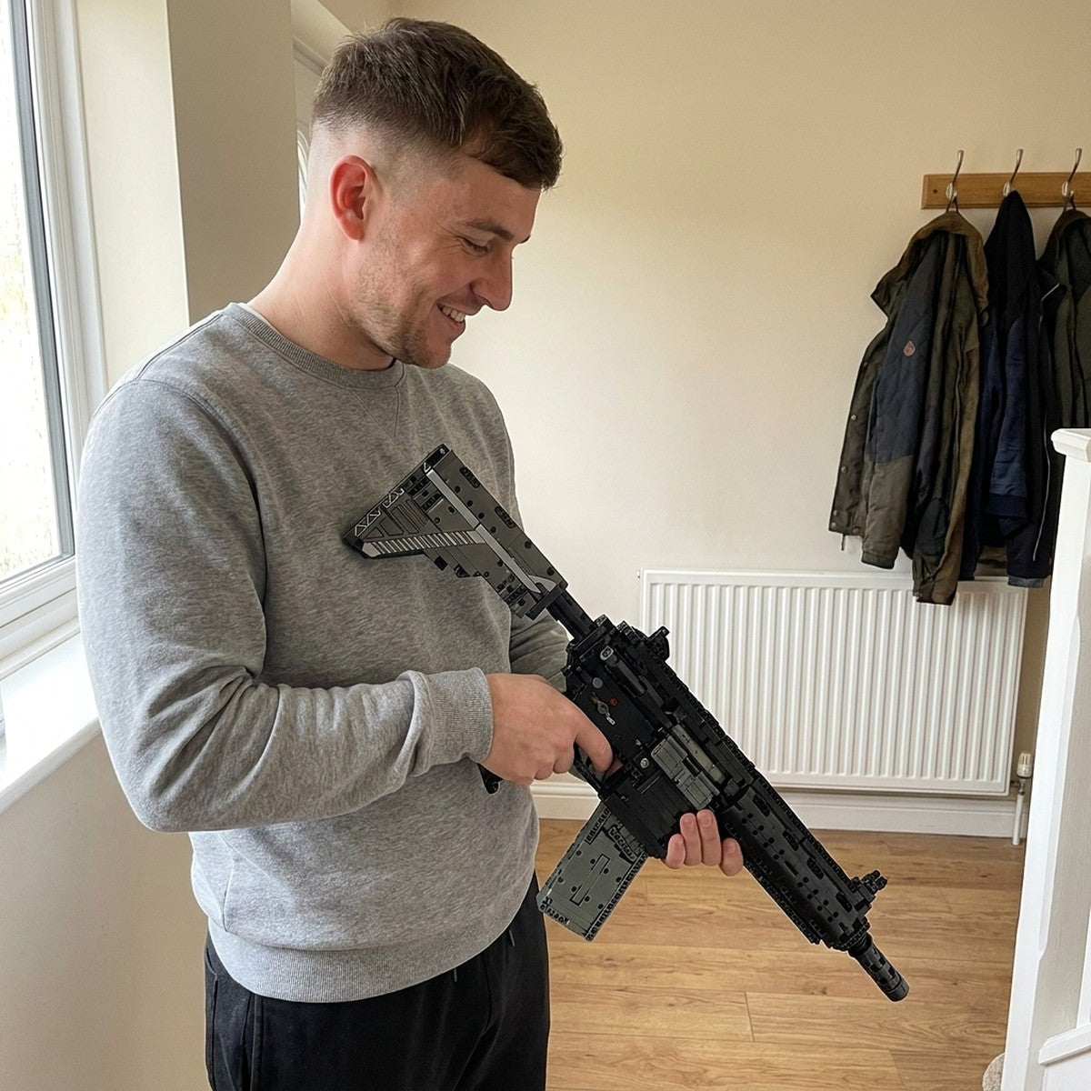 Sliding out the adjustable stock of the finished HK-416-D brick model