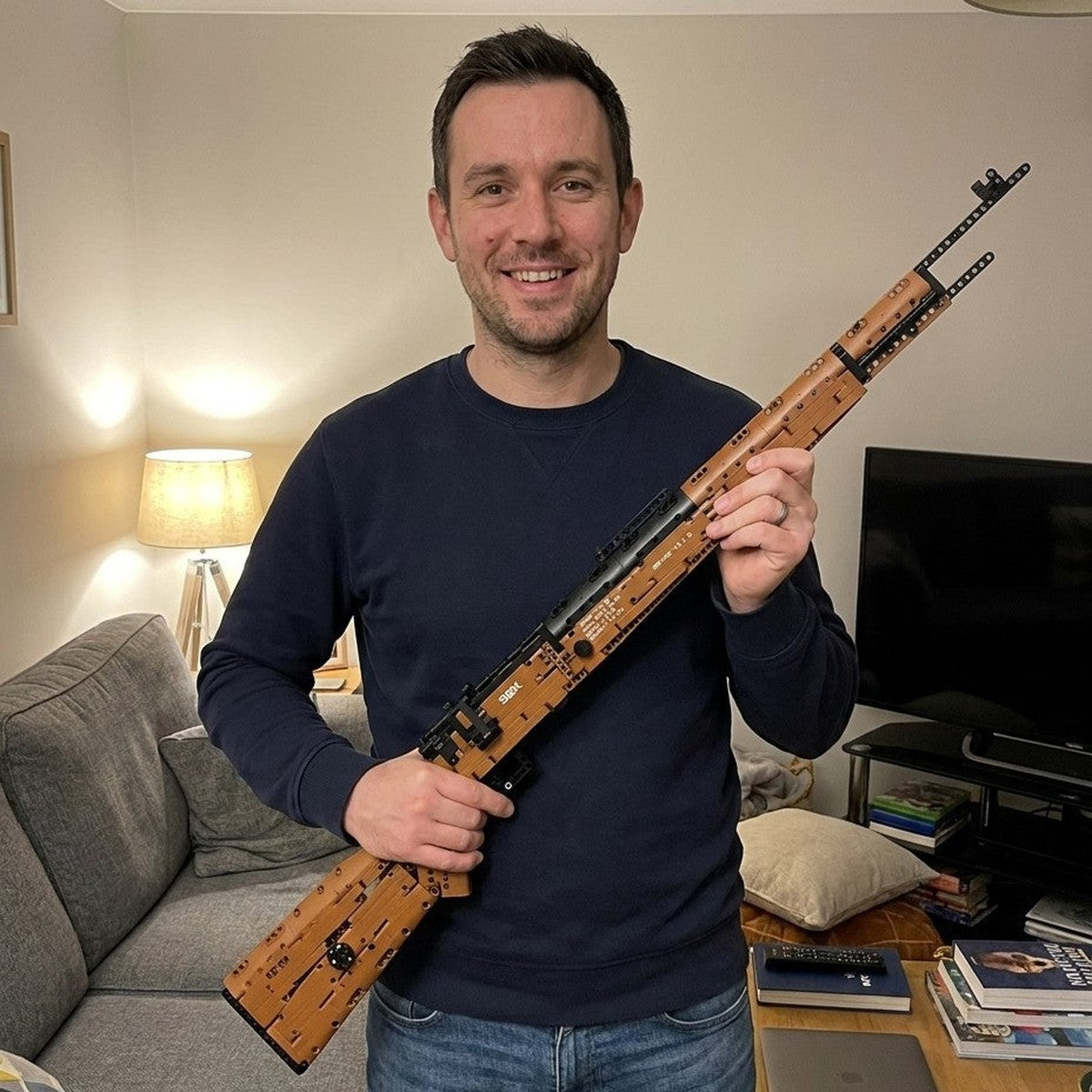 Finished Karabiner 98K brick model held in a living room, full 104 cm length