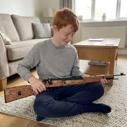 Boy with the finished Karabiner 98K brick model on his lap