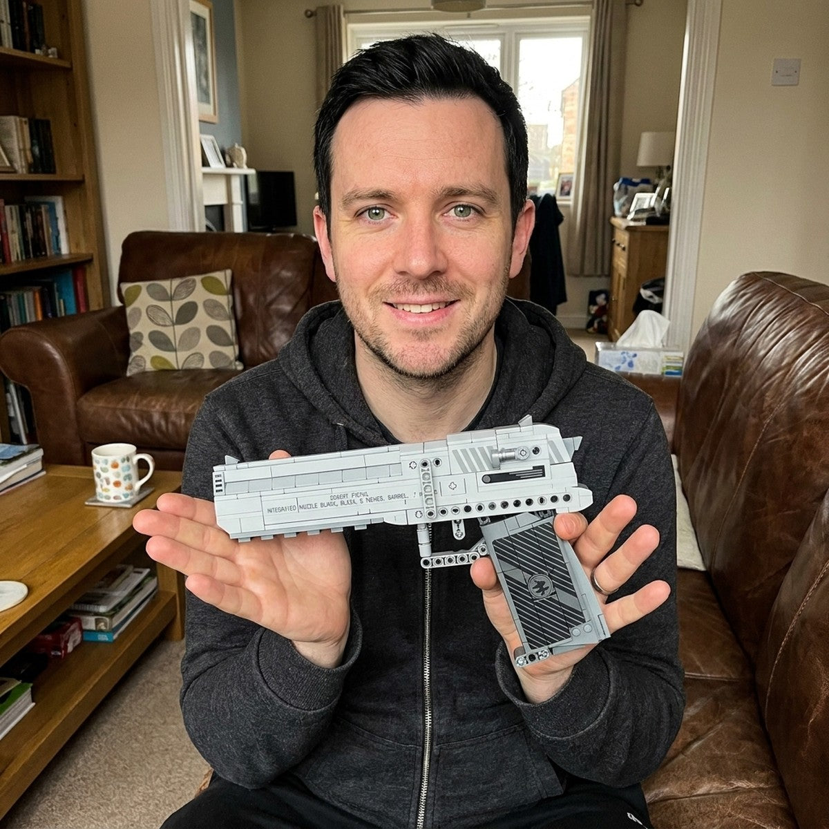 Presenting the finished Magnum Eagle brick pistol on the sofa