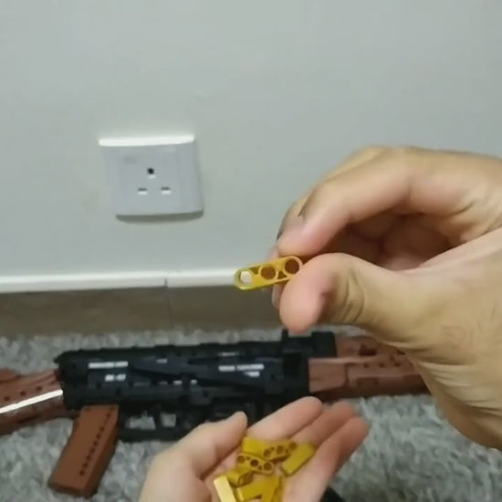 AK-47 brick kit — loading the rounds and fitting the magazine (no sound)