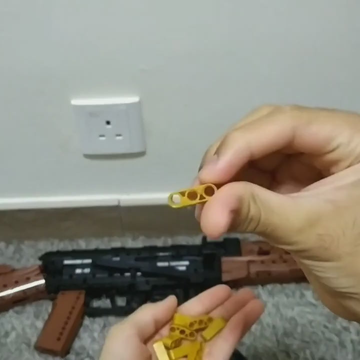 AK-47 brick kit — loading the rounds and fitting the magazine (no sound)